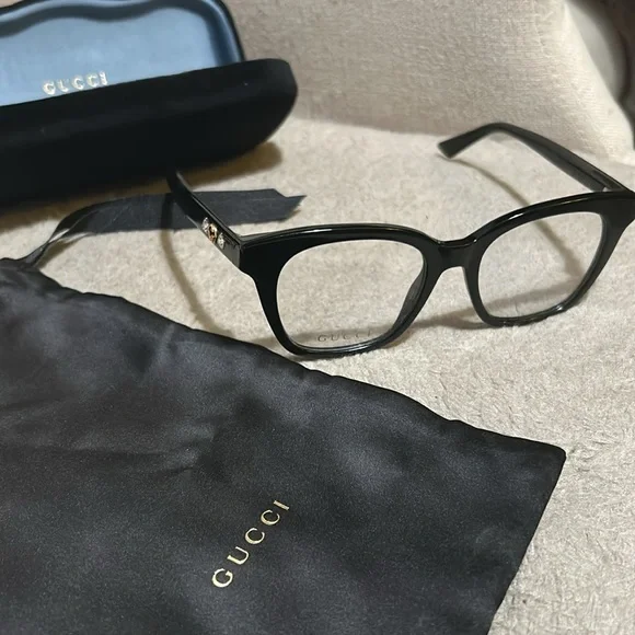 New gucci glasses. Never worn. Authentic. Can provide receipt. Cloth & case. - Picture 6 of 14